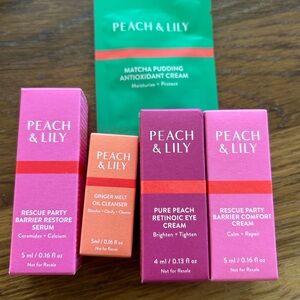 Brand new peach & Lily 5 pieces travel set